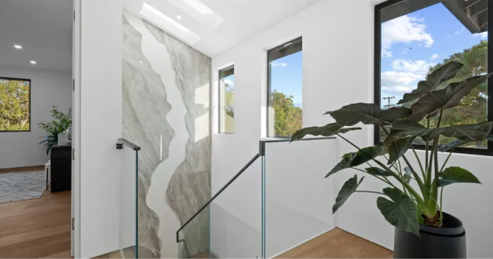 Overhead view of custom modern staircase design in Cupertino designed and built by Ritz Builders