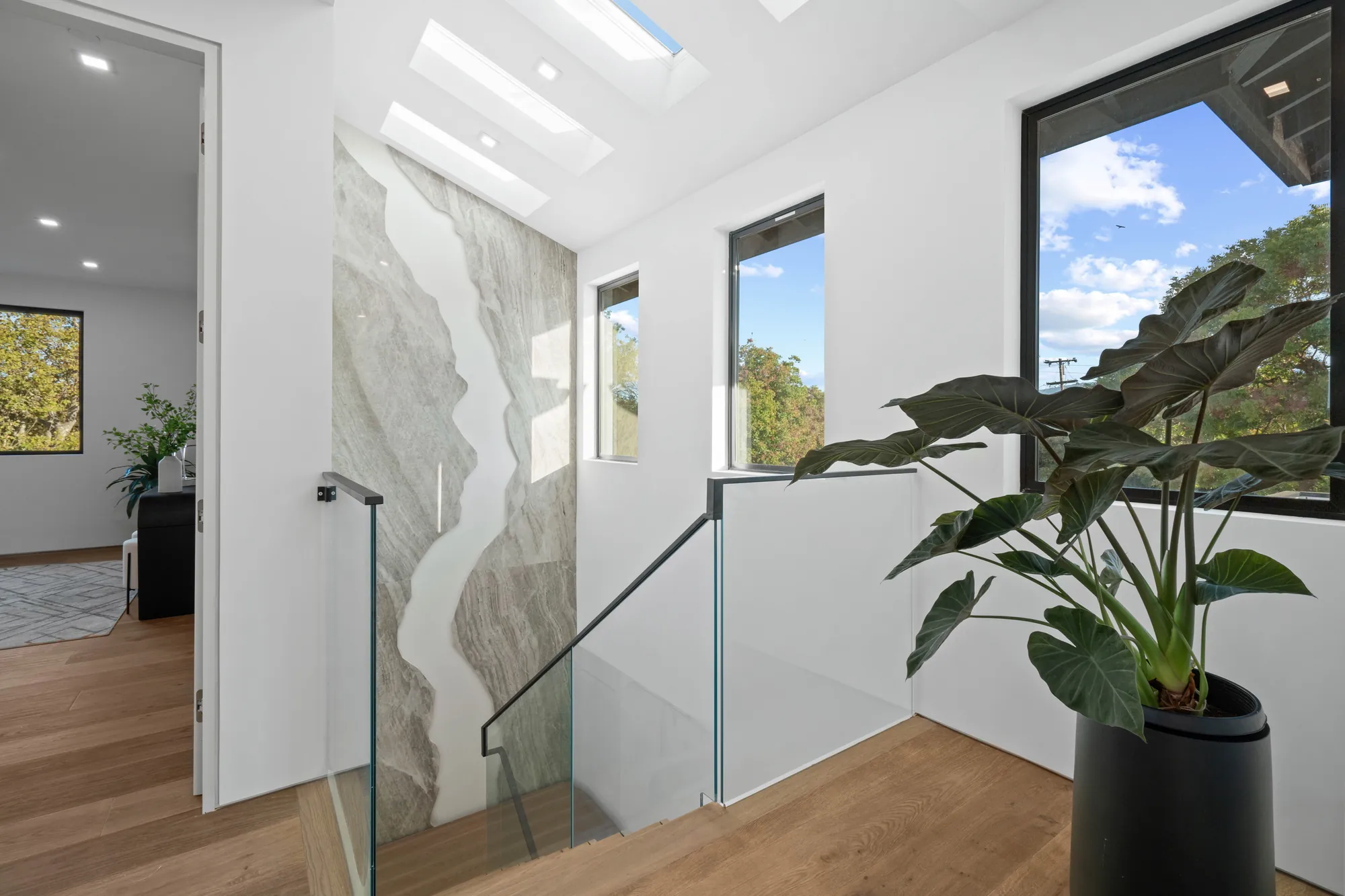 Interior custom luxury atherton home staircase with unique design by ritz builders